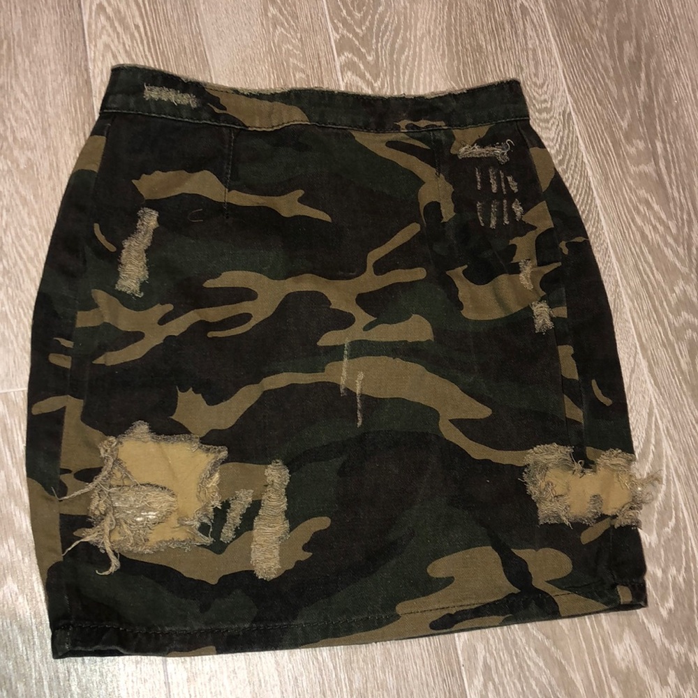 Distressed camo denim skirt